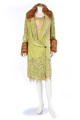 Lot 44 - A pistachio-green velvet opera coat, late...