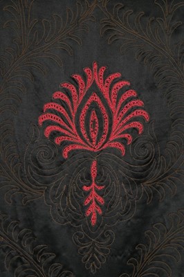 Lot 59 - An orientalist embroidered black satin opera...