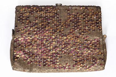 Lot 107 - An early Chanel beaded gold lamé evening purse,...