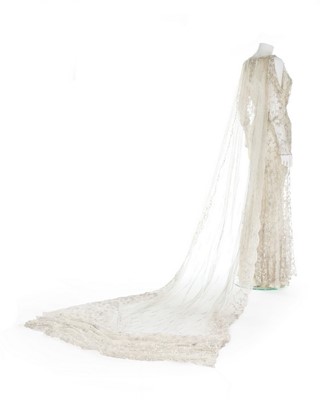Lot 104 - A fine couture bridal gown and train, probably...