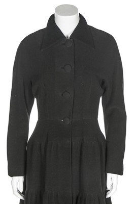 Lot 110 - A Jacques Griffe black wool coat, 1940s, with...
