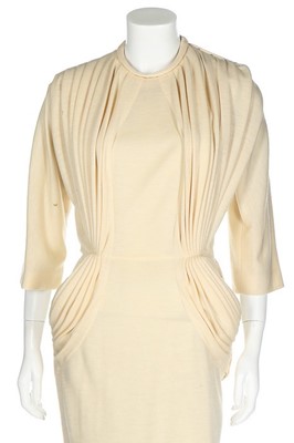 Lot 120 - A Madame Grès couture knitted cream wool...