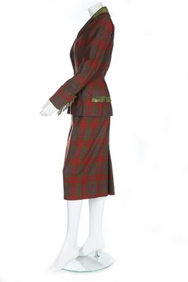Lot 132 - A Carven couture tartan wool day suit, circa...