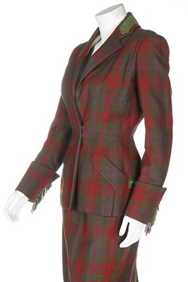 Lot 132 - A Carven couture tartan wool day suit, circa...
