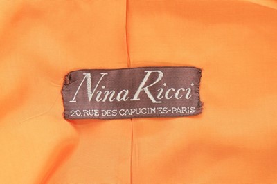 Lot 136 - A Nina Ricci couture tangerine moiré evening...