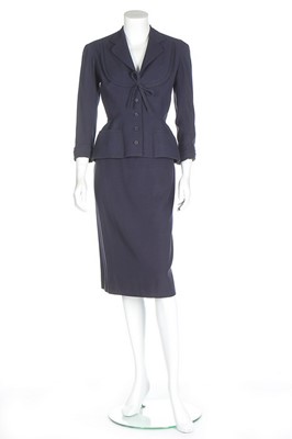 Lot 137 - A Pierre Balmain couture navy wool suit, circa...