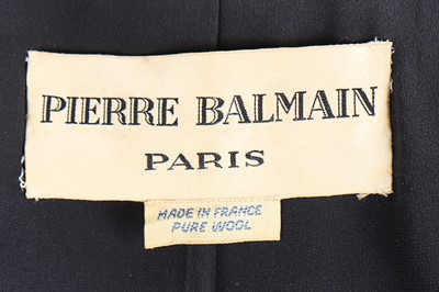 Lot 137 - A Pierre Balmain couture navy wool suit, circa...