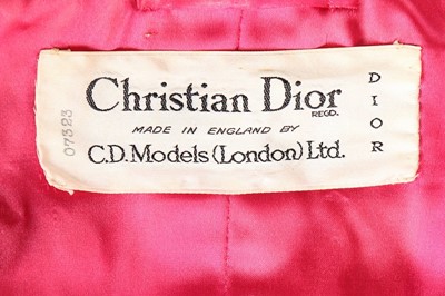 Lot 118 - A Christian Dior London black ottoman evening...