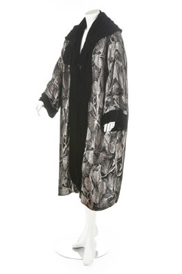 Lot 351 - A black and silver lame opera coat, late 1920s-...