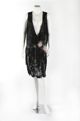 Lot 377 - A black sequined flapper dress, late 1920s,...