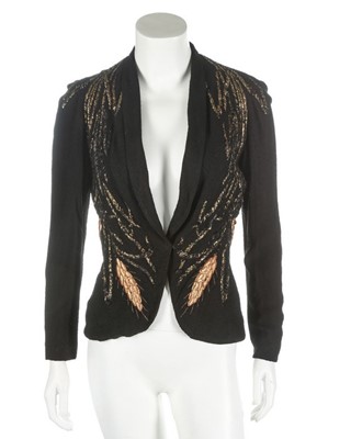 Lot 111 - A black rayon crpe evening jacket, probably...