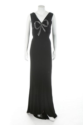 Lot 148 - A good black bias-cut jersey evening gown,...