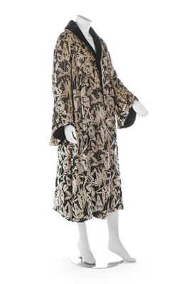 Lot 258 - A cut velvet evening coat, 1930s, the lamé...