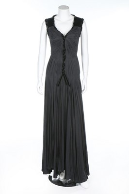 Lot 27 - A Madame Gres black silk jersey evening gown,...