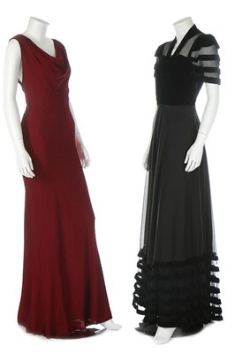 Lot 195 - A Gilbert Adrian couture black crepe evening...