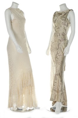 Lot 195 - A Gilbert Adrian couture black crepe evening...