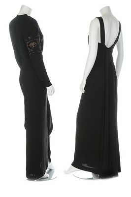 Lot 195 - A Gilbert Adrian couture black crepe evening...