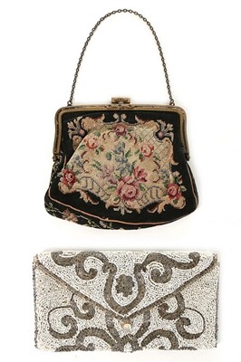 Lot 195 - A Gilbert Adrian couture black crepe evening...