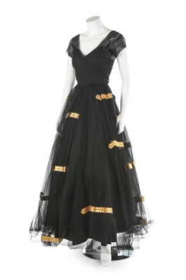 Lot 254 - Three black evening gowns, late 1940s-50s,...