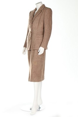 Lot 388 - An Hermès light brown tweed suit, late 1940s,...