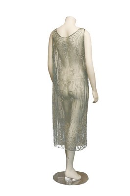 Lot 312 - A sea-blue beaded tulle tabard, 1920s, the...