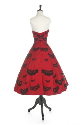 Lot 121 - An American copy of a Dior cocktail dress,...