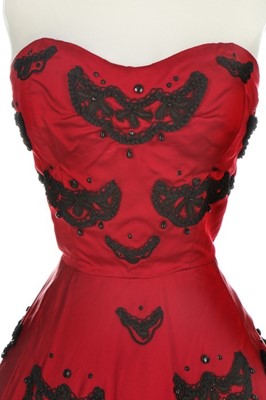 Lot 121 - An American copy of a Dior cocktail dress,...
