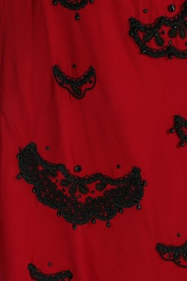 Lot 121 - An American copy of a Dior cocktail dress,...