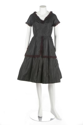 Lot 124 - A Madeleine de Rauch black taffeta dinner...