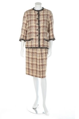 Lot 41 - A Chanel couture checked wool suit, 1969,...