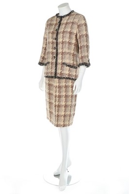Lot 41 - A Chanel couture checked wool suit, 1969,...