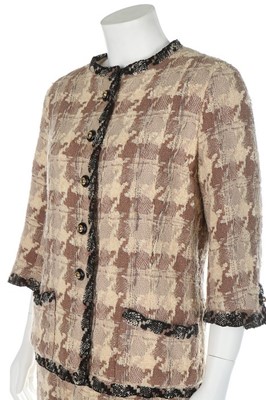Lot 41 - A Chanel couture checked wool suit, 1969,...