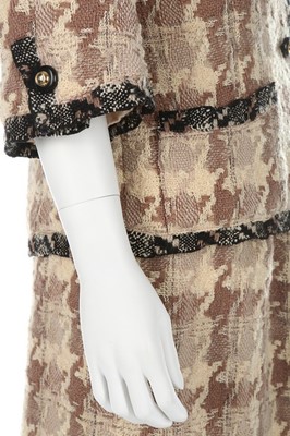 Lot 41 - A Chanel couture checked wool suit, 1969,...