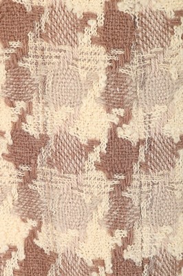 Lot 41 - A Chanel couture checked wool suit, 1969,...