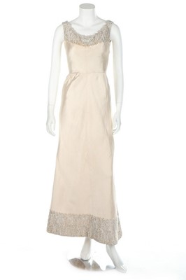 Lot 44 - A Jacques Heim couture ivory slubbed silk...