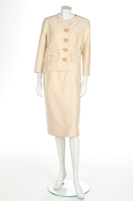 Lot 52 - A Balenciaga couture ivory silk suit, circa...