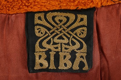 Lot 58 - A Biba rust coloured towelling maxi-coat, 1969,...