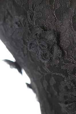 Lot 141 - A Maggy Rouff couture black lace cocktail...