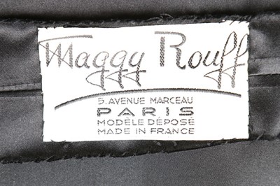 Lot 141 - A Maggy Rouff couture black lace cocktail...