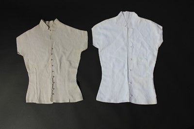 Lot 443 - Two crochet bodices in white and ecru, 1950s,...