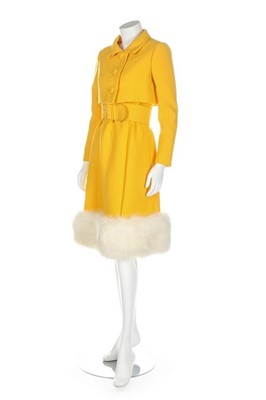 Lot 275 - A Norman Norell buttercup-yellow wool suit,...