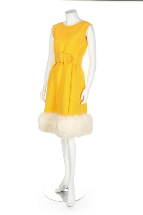 Lot 275 - A Norman Norell buttercup-yellow wool suit,
