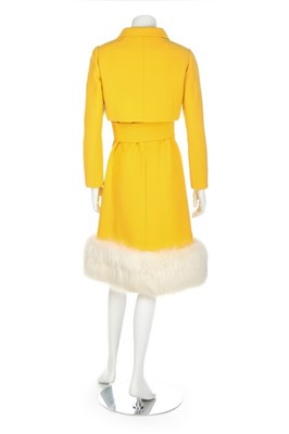 Lot 275 - A Norman Norell buttercup-yellow wool suit,...