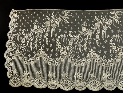 Lot 451 - A Brussels mixed lace dress flounce, circa...