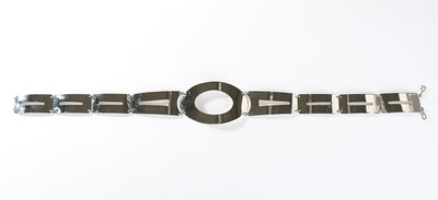 Lot 374 - A Pierre Cardin polished chrome belt, late...