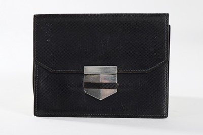 Lot 385 - An Hermès navy leather purse, 1930s, stamped...