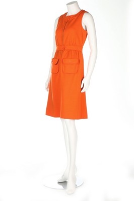 Lot 392 - An André Courrèges orange wool jersey dress,...