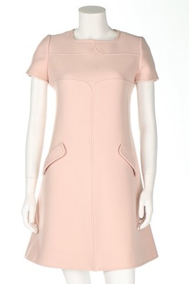 Lot 393 - An André Courrèges baby-pink wool mini dress,...