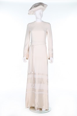 Lot 28 - A Nina Ricci ivory crepe bridal gown and beret,...