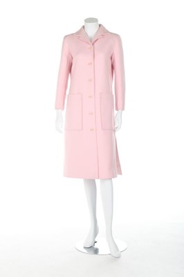 Lot 30 - A Courrèges couture pink cotton coat, 1970s,...